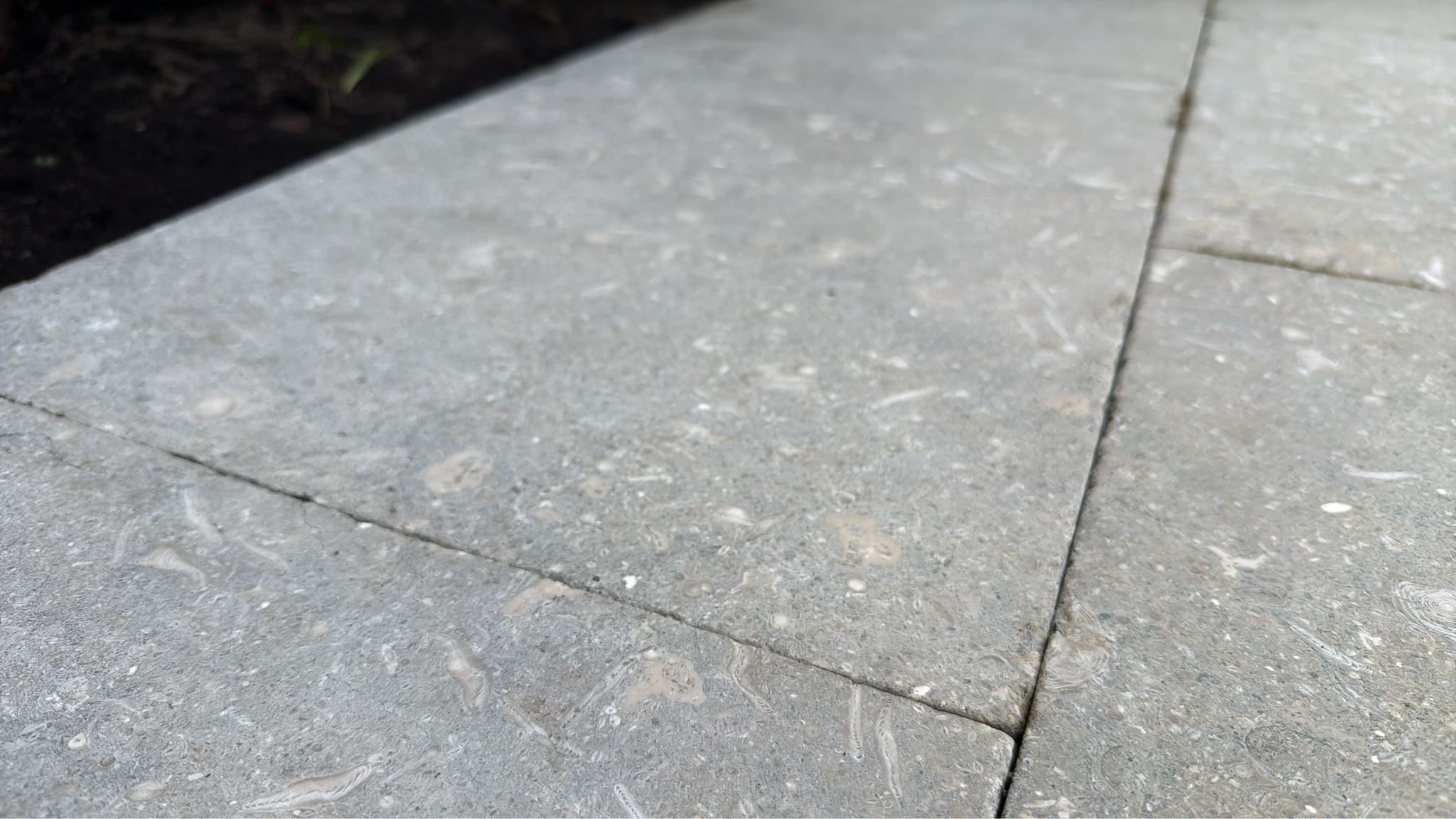 Limestone paving cleaned with a gentle, surface-specific method